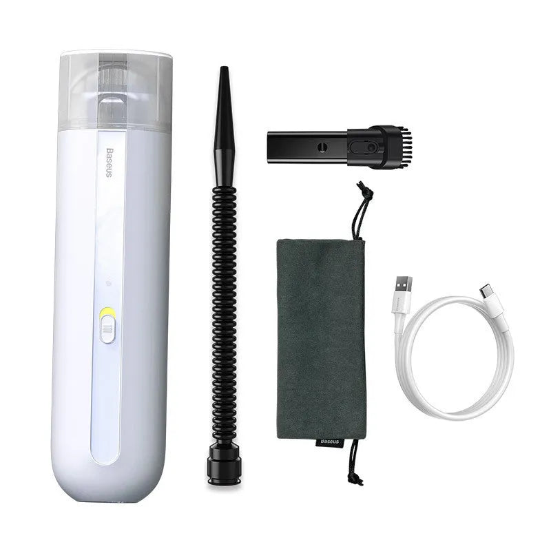 Starry sky black handheld car vacuum cleaner with a blowing hose attachment on a car seat.