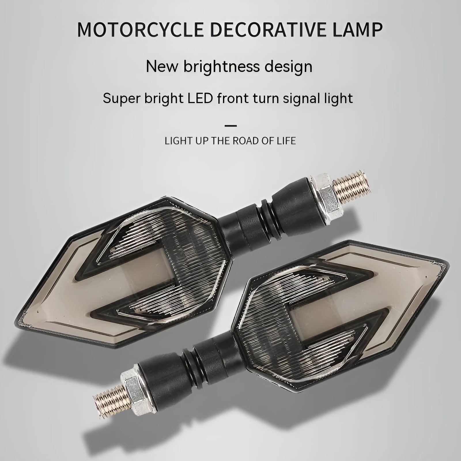 Arrow-shaped LED motorcycle turn signal light unit for 12V vehicles, shown in available colour options.