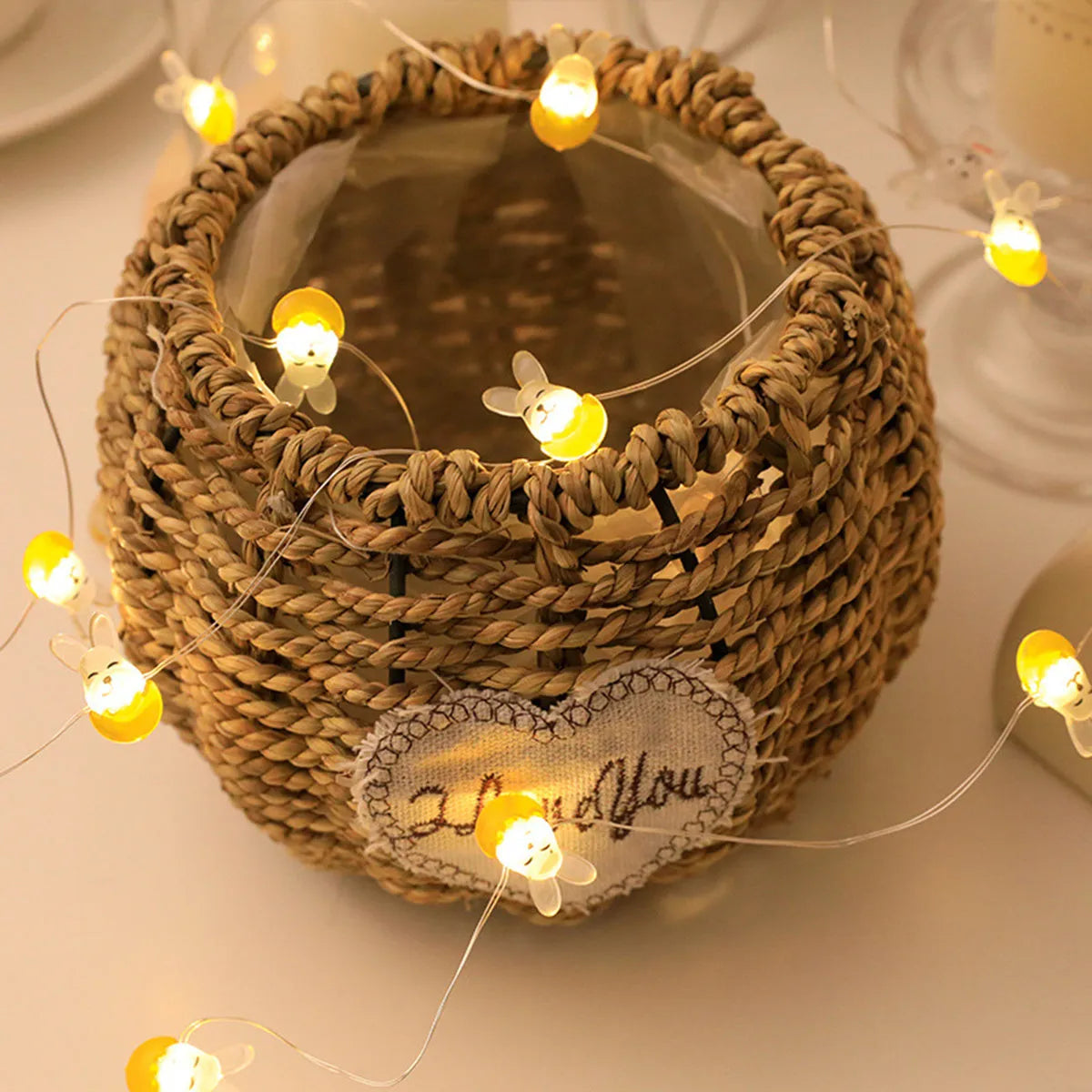 Easter LED bunny string lights with carrot and white rabbit bulbs on a dark background