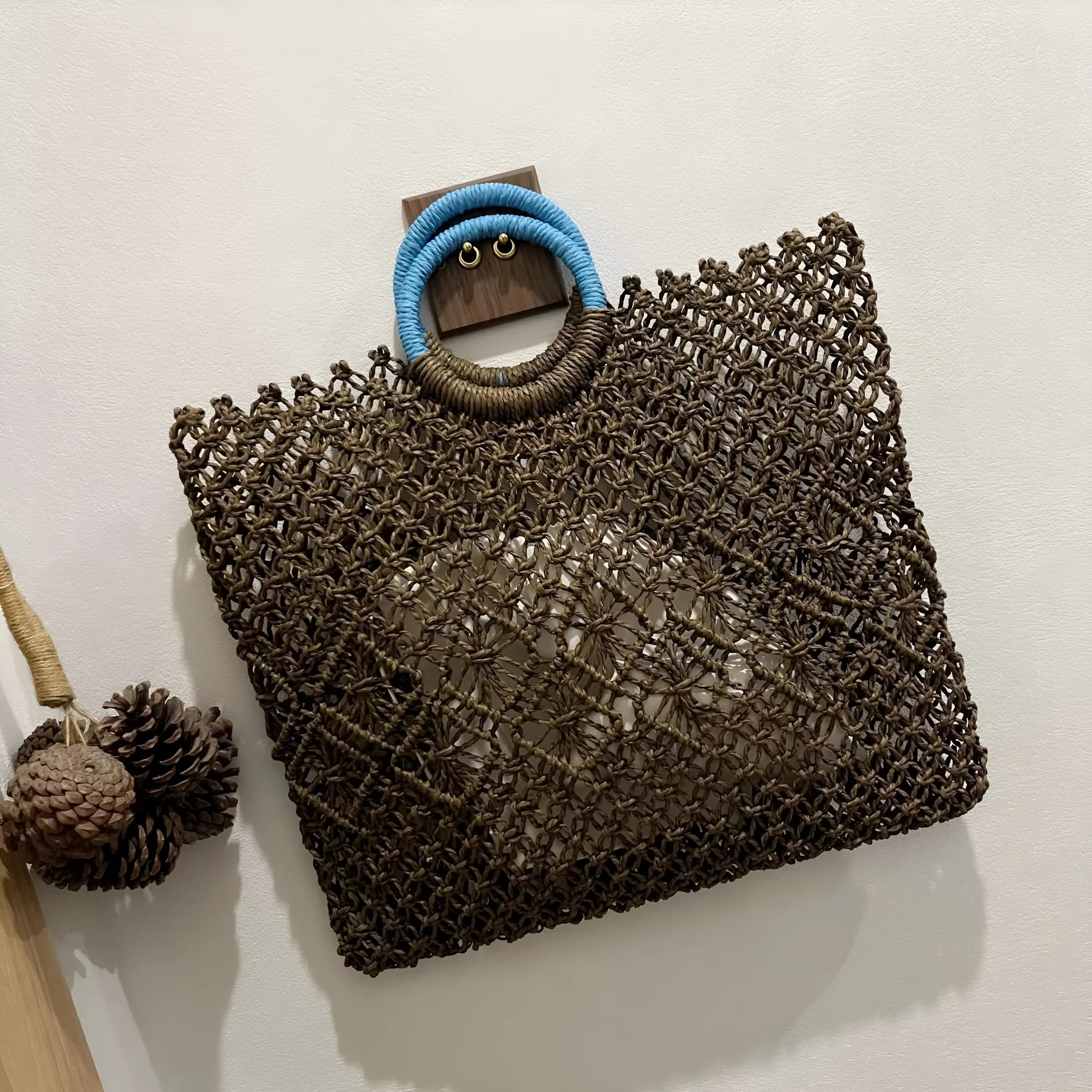 Minority all-match hollow handmade straw bag in dark brown with square vertical shape, 44cm wide