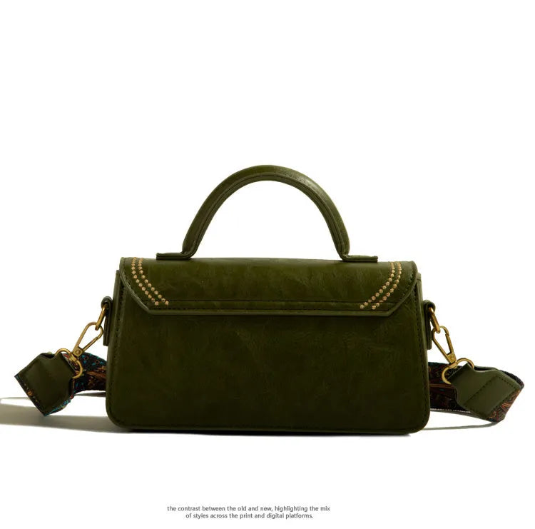 Brown retro-textured women's messenger bag with a shoulder strap, showing internal phone and file pockets.