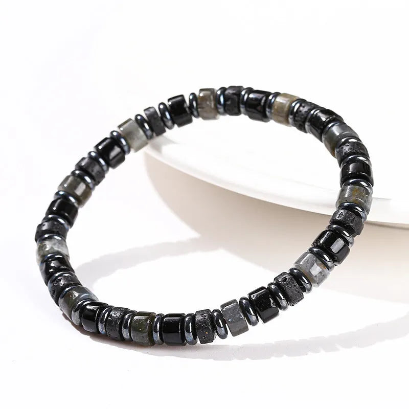 Natural haematite bracelet with 6mm volcanic rock spacer beads in geometric shape