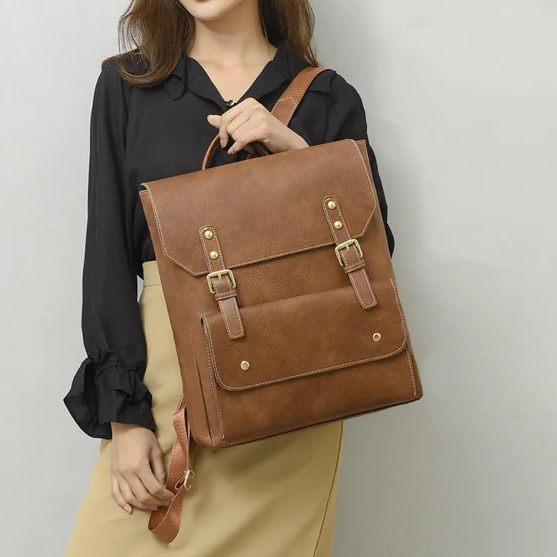 Soft retro style PU backpack shown in black, brown, creamy white, and dark brown colours