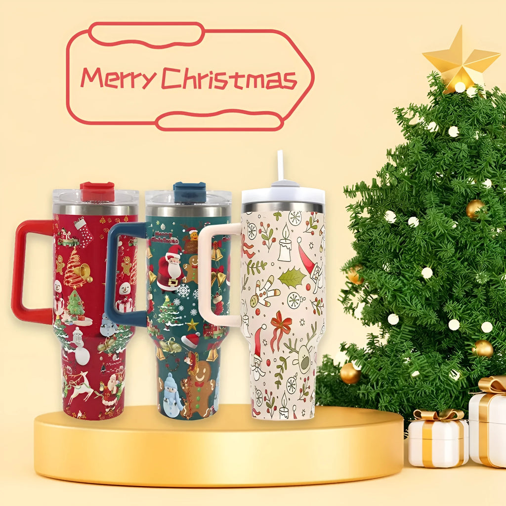 Red and green Christmas pattern stainless steel travel tumbler with handle and straw.