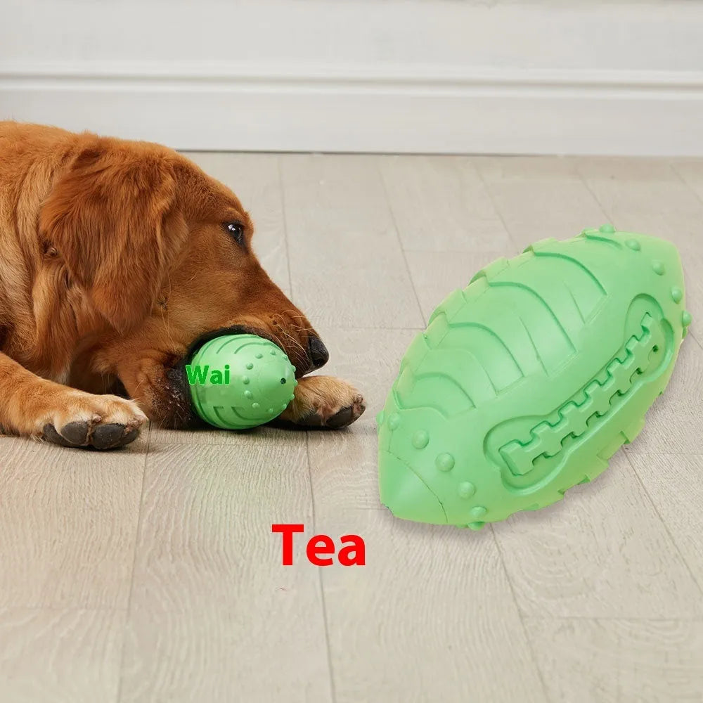 Sapphire blue rubber dog training ball with rugby shape for interactive play and teeth cleaning