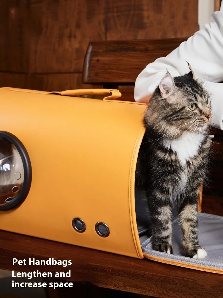 Soft-sided pet carrier bag for cats and small dogs in Elk Orange, Genie Green, or Monet Grey colour options