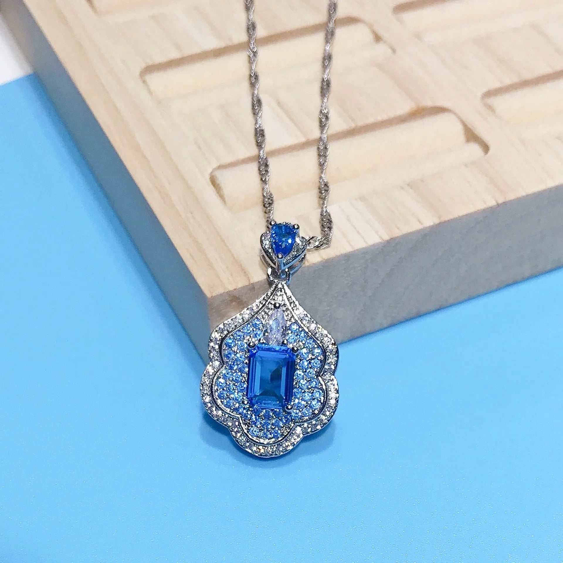 Sea blue geometric copper pendant with aquamarine mirror finish for jewellery making