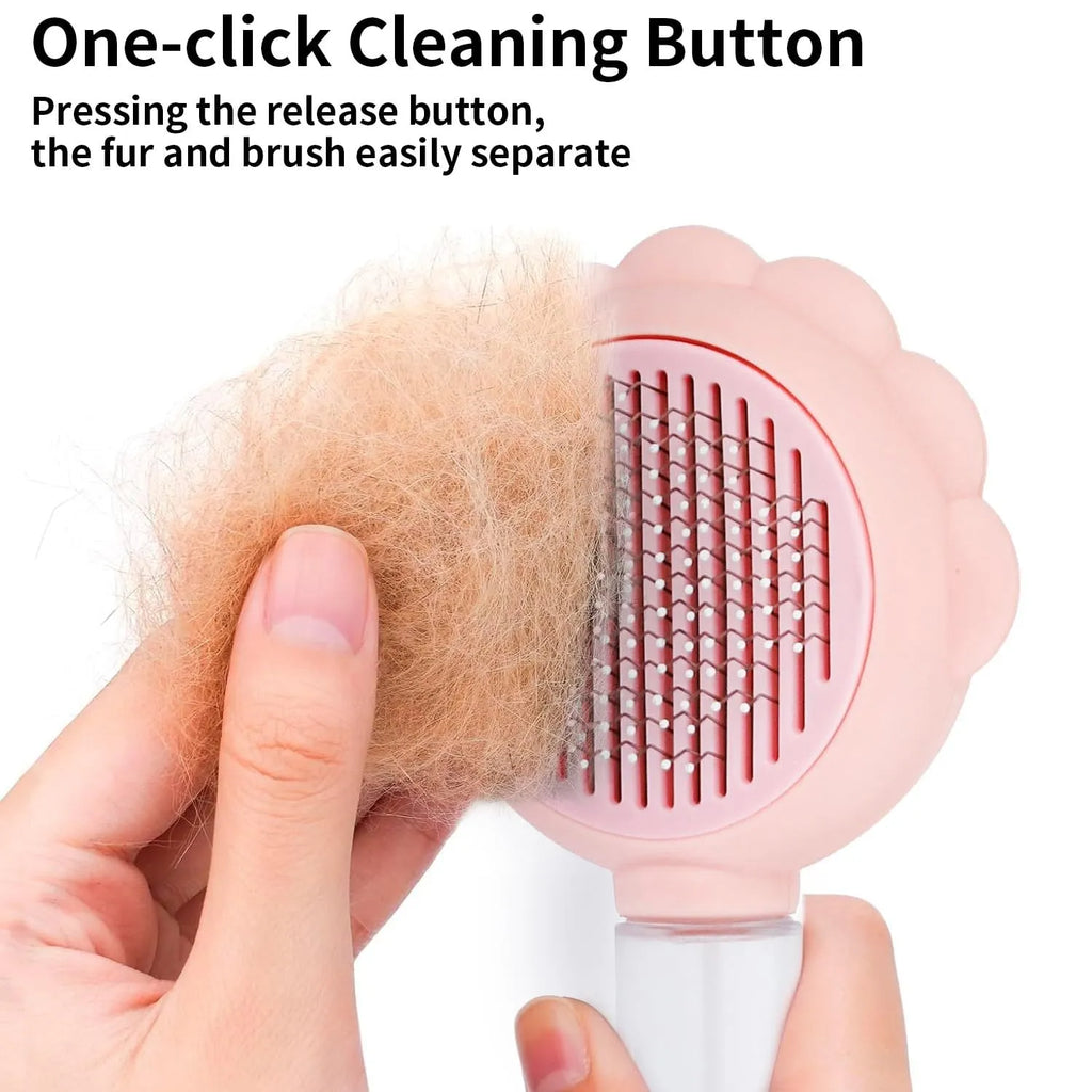 Grey spray cat brush with release button for grooming dogs and cats.
