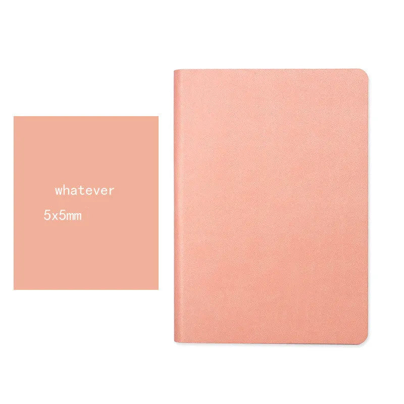 Blue A5 dotted notebook with soft imitation leather cover open to show dot grid pages