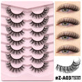 Box of black artificial fibre false eyelashes in a natural thick style with a tube of adhesive glue.