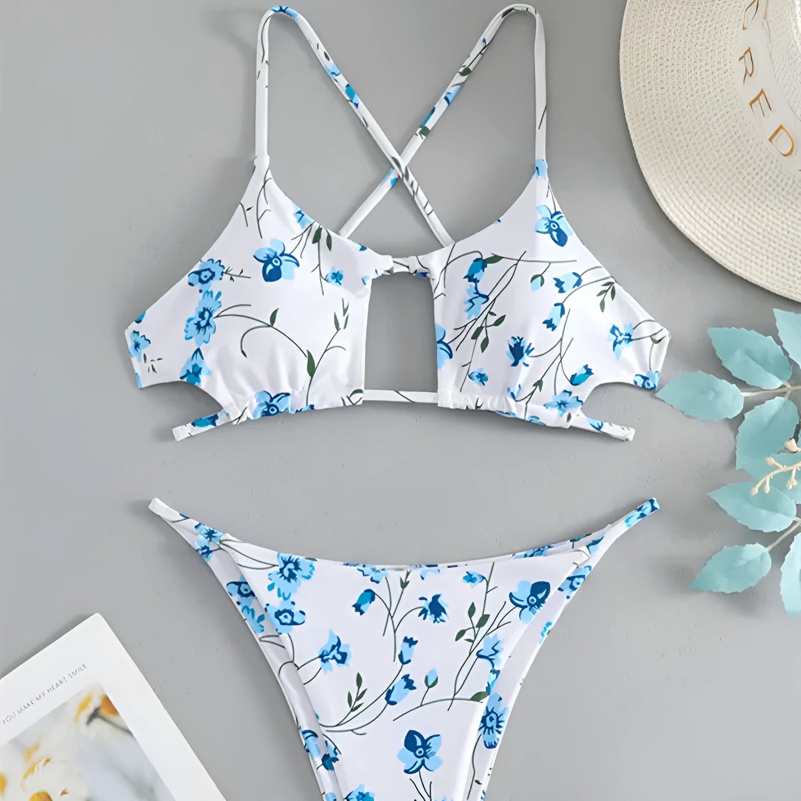 Women's floral swimsuit set with tie-neck triangle top and matching shorts