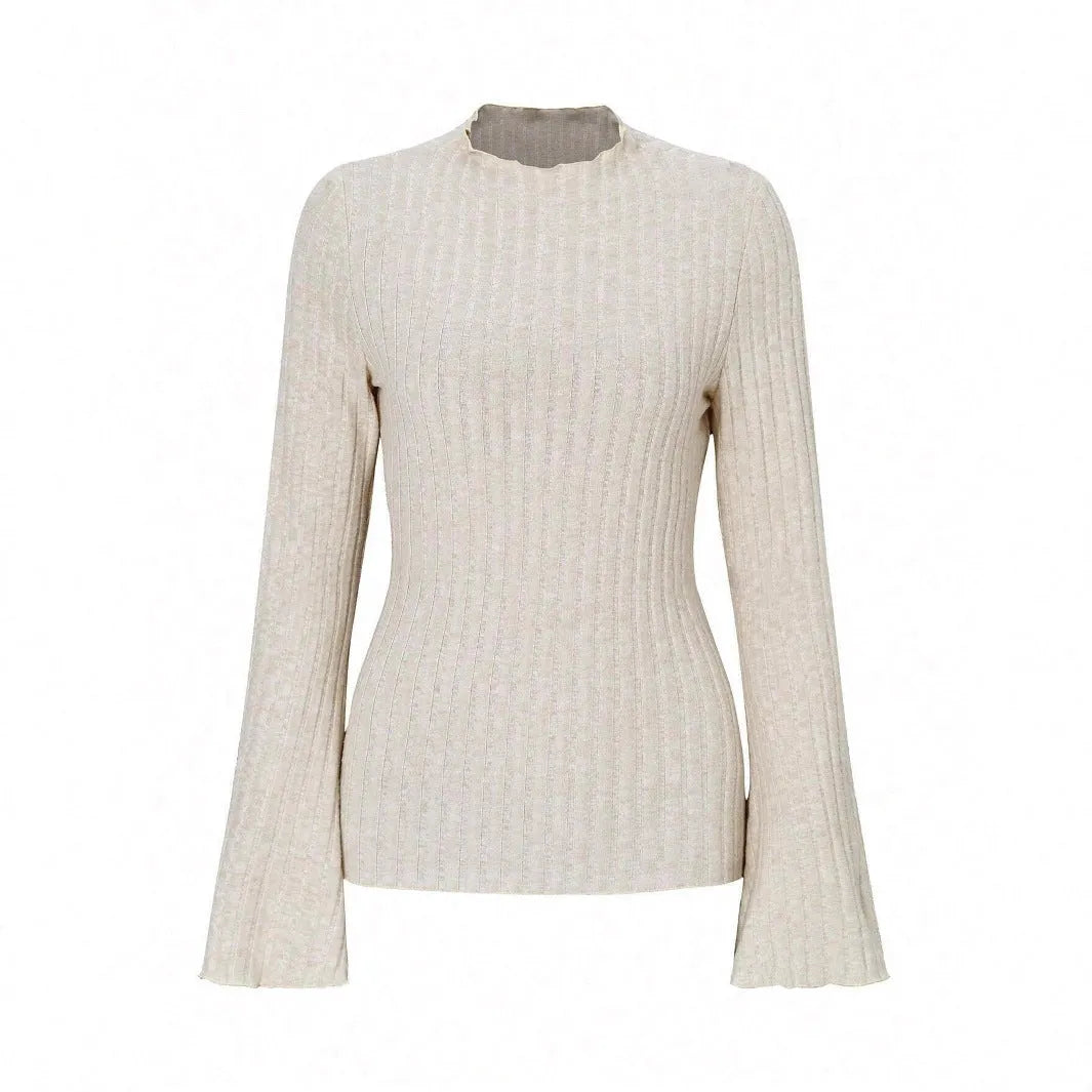 Long sleeve casual top in black with lantern sleeves and a sunken stripe pattern, laid flat.