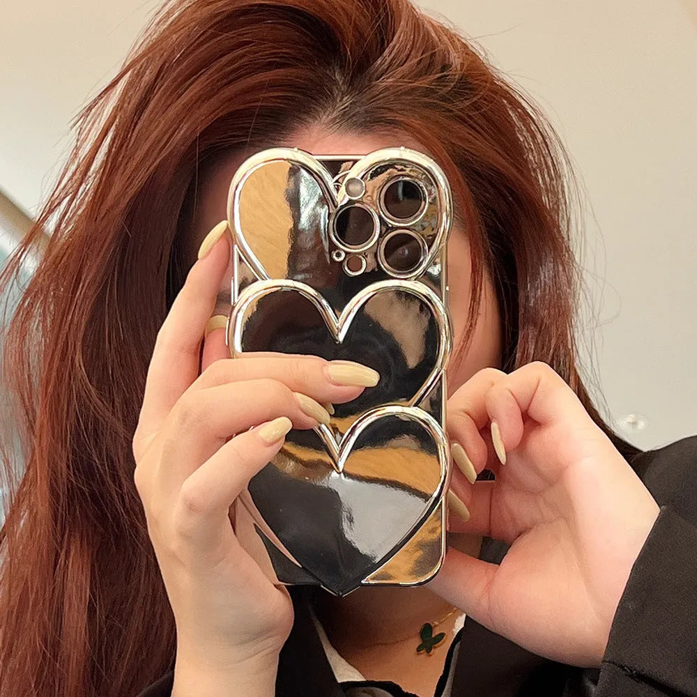 iPhone mobile phone case with shiny silver electroplated love design on a solid colour soft TPU back cover.