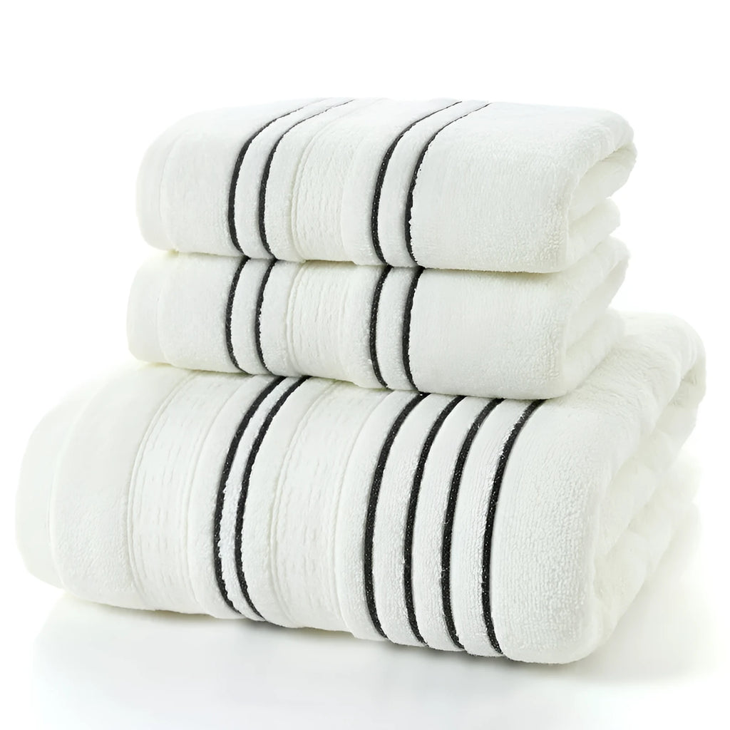 Pure cotton bath towel set showing one large bath towel and two smaller hand towels in matching colour