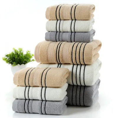 Pure cotton bath towel set showing one large bath towel and two smaller hand towels in matching colour