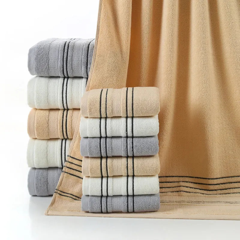 Pure cotton bath towel set showing one large bath towel and two smaller hand towels in matching colour