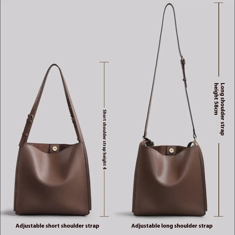 Brown genuine leather women's commuter bag with shoulder straps showing interior organisation compartments