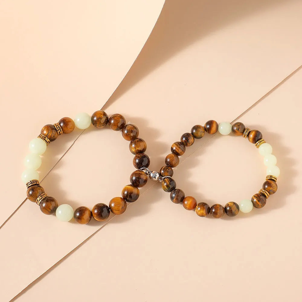 Geometric couple bracelets with amber luminous stones in simple retro style