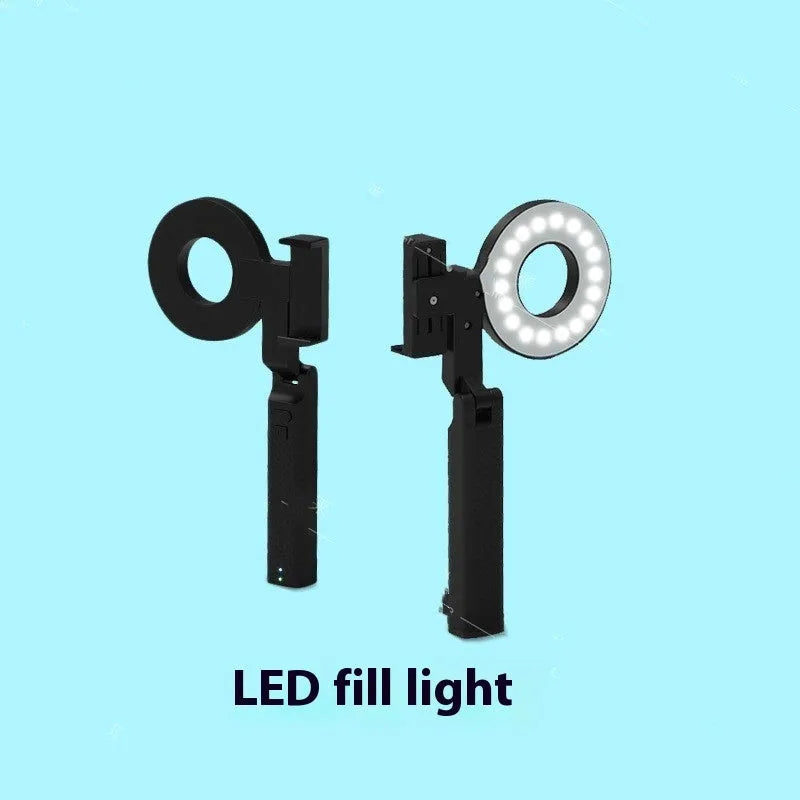 Black handheld LED fill light for mobile phone photography, showing compact portable design.