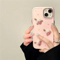 Pearl Pink silicone iPhone case with 3D pearl small flower, rhinestone, and electroplated back cover