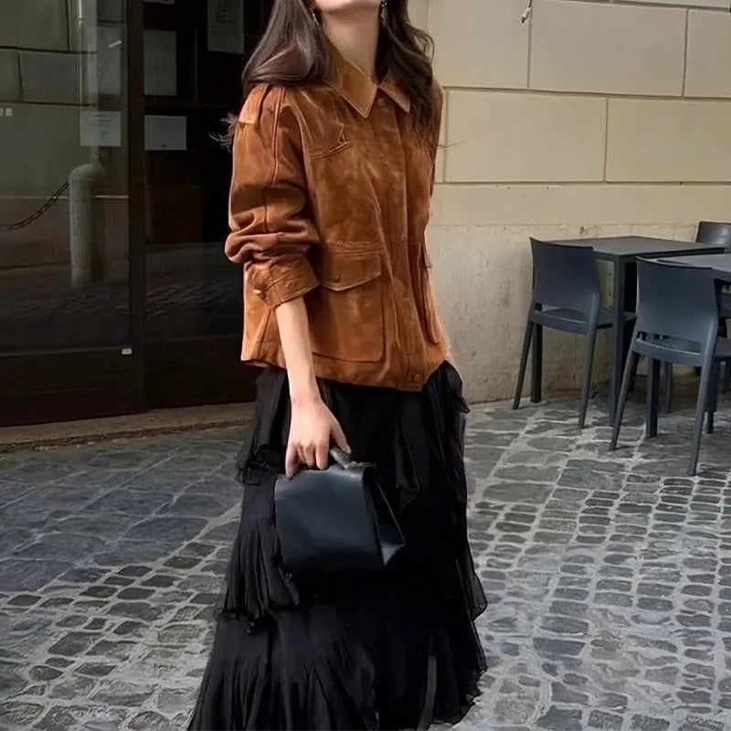 Women's brown suede-effect street chic coat with regular sleeves on a hanger