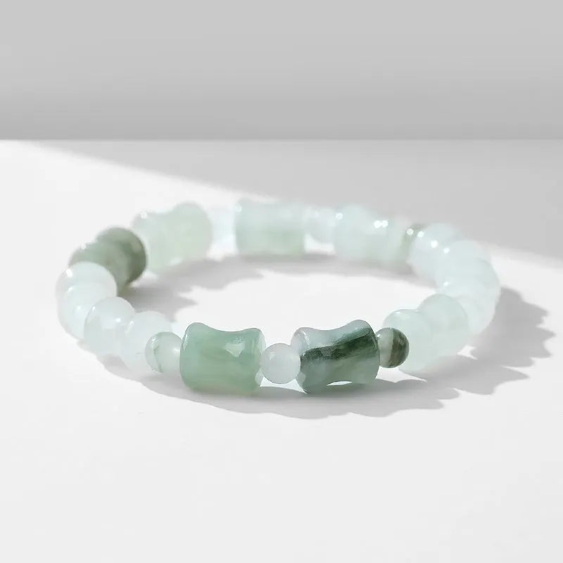 Natural chalcedony beaded bracelet with diamond-shaped jade stones and coconut shell beads on elastic string