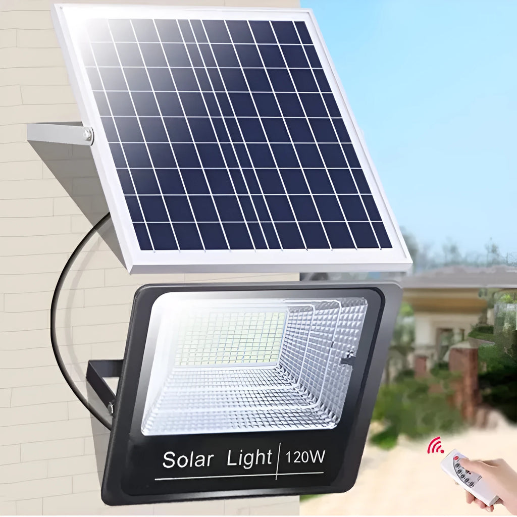 Black Cornucopia solar-powered LED flood light with remote control mounted on an outdoor wall