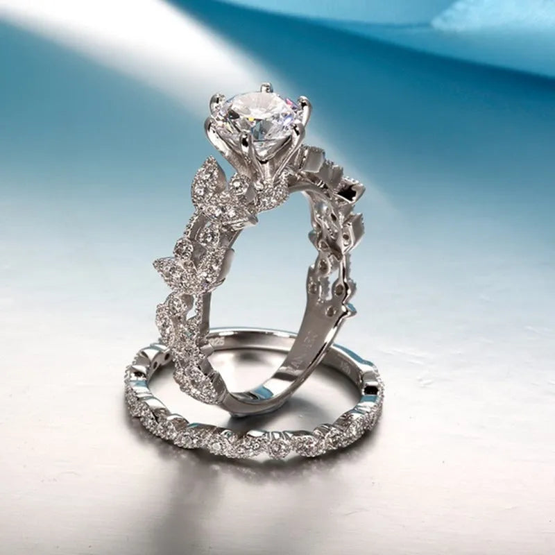 Tree leaf diamond engagement ring with round princess set diamond