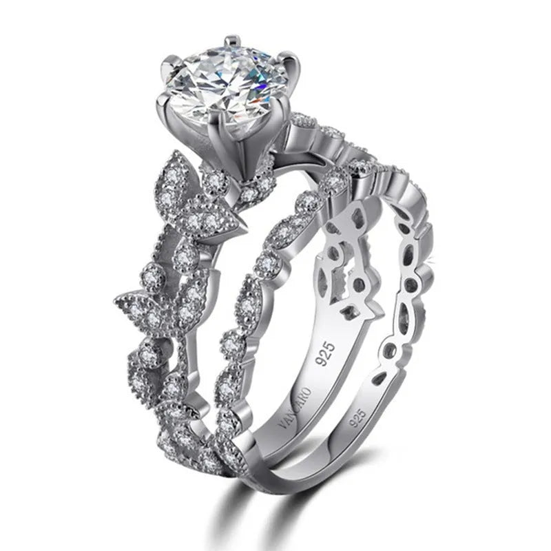 Tree leaf diamond engagement ring with round princess set diamond