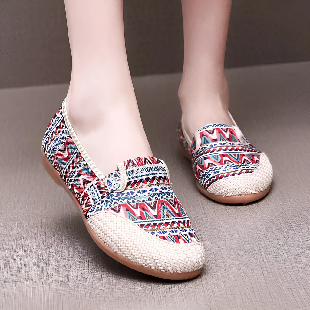 Women's flat-heel ethnic style cloth shoes in assorted colours with colour stitching and a shallow mouth design