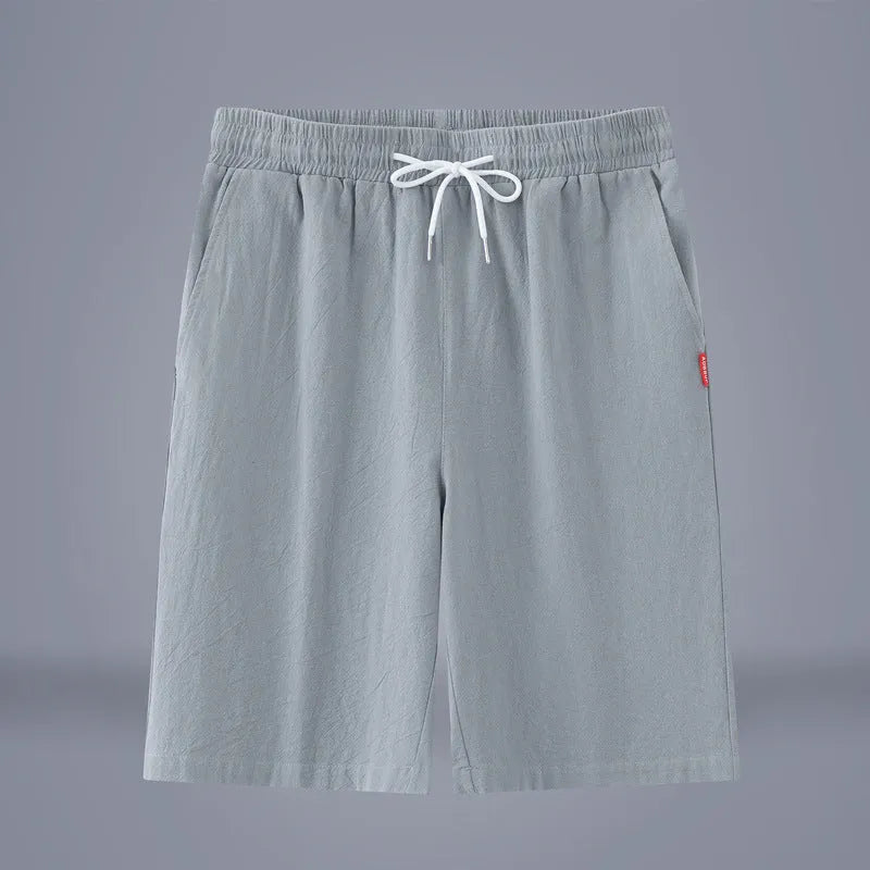 Chinese style solid colour cropped summer pants on a hanger.