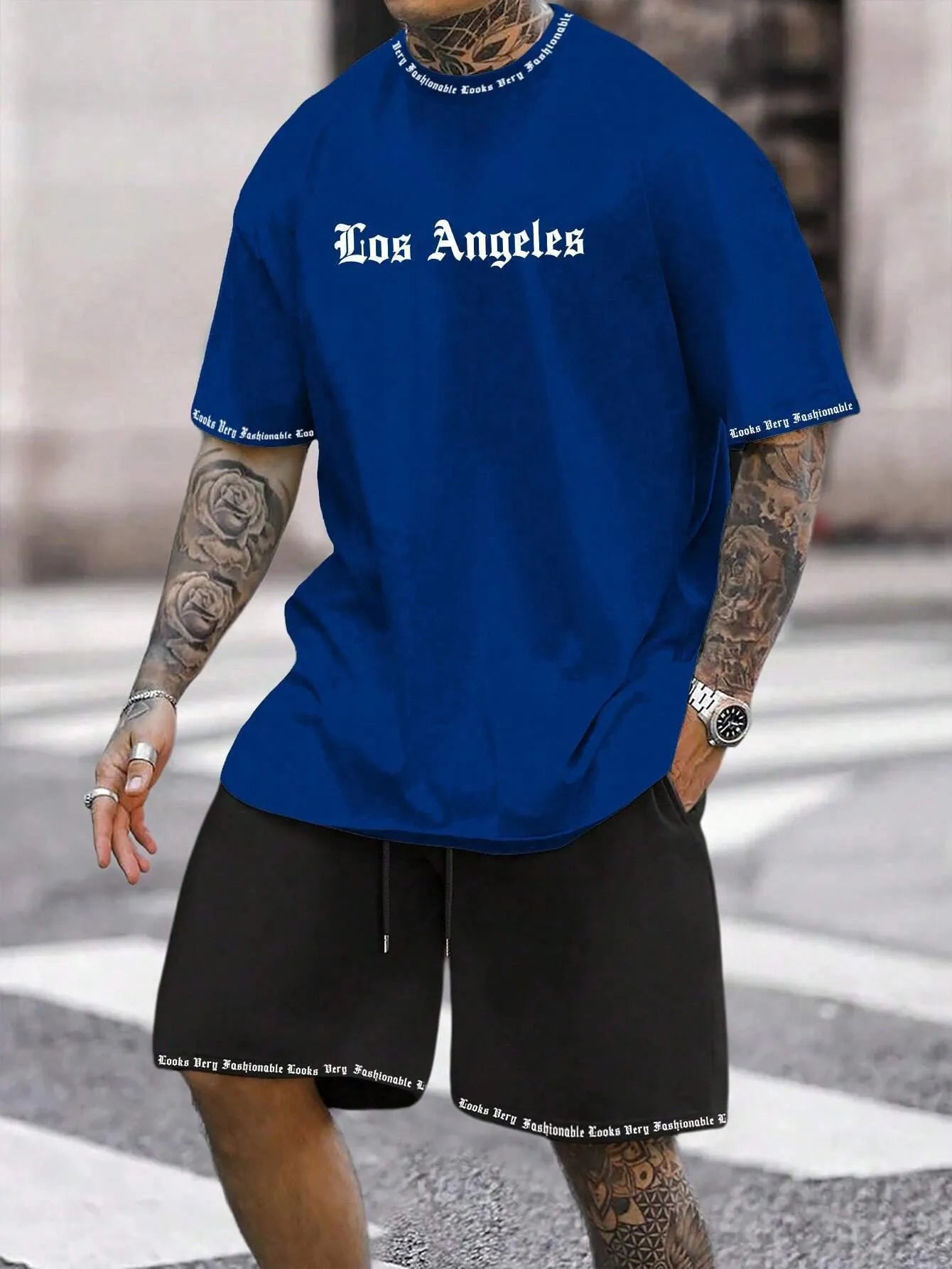 Man wearing a matching short-sleeved top and shorts from the quick-dry sports set.