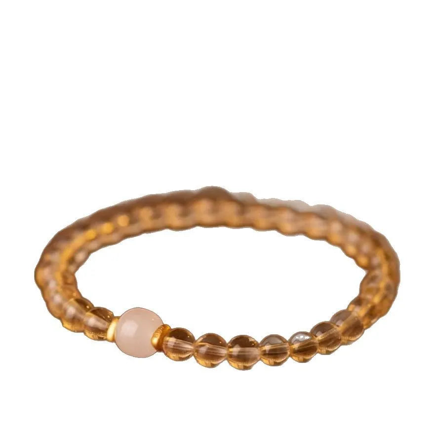 Rutilated quartz bracelet with Brazilian quartz beads in green or white colour options