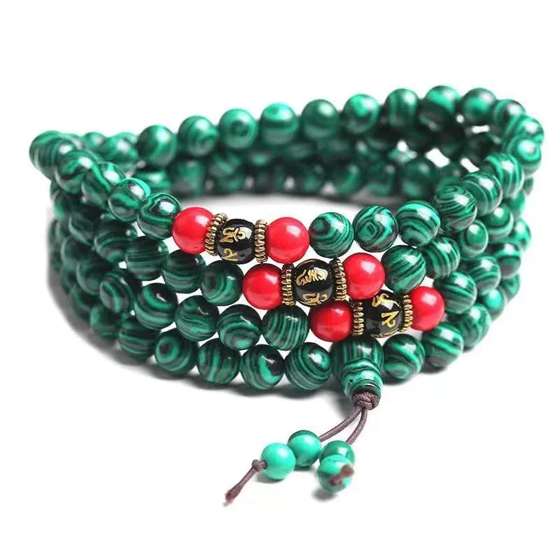 Turquoise Tibetan bracelet with 108 polished synthetic stone beads in 6mm and 8mm sizes