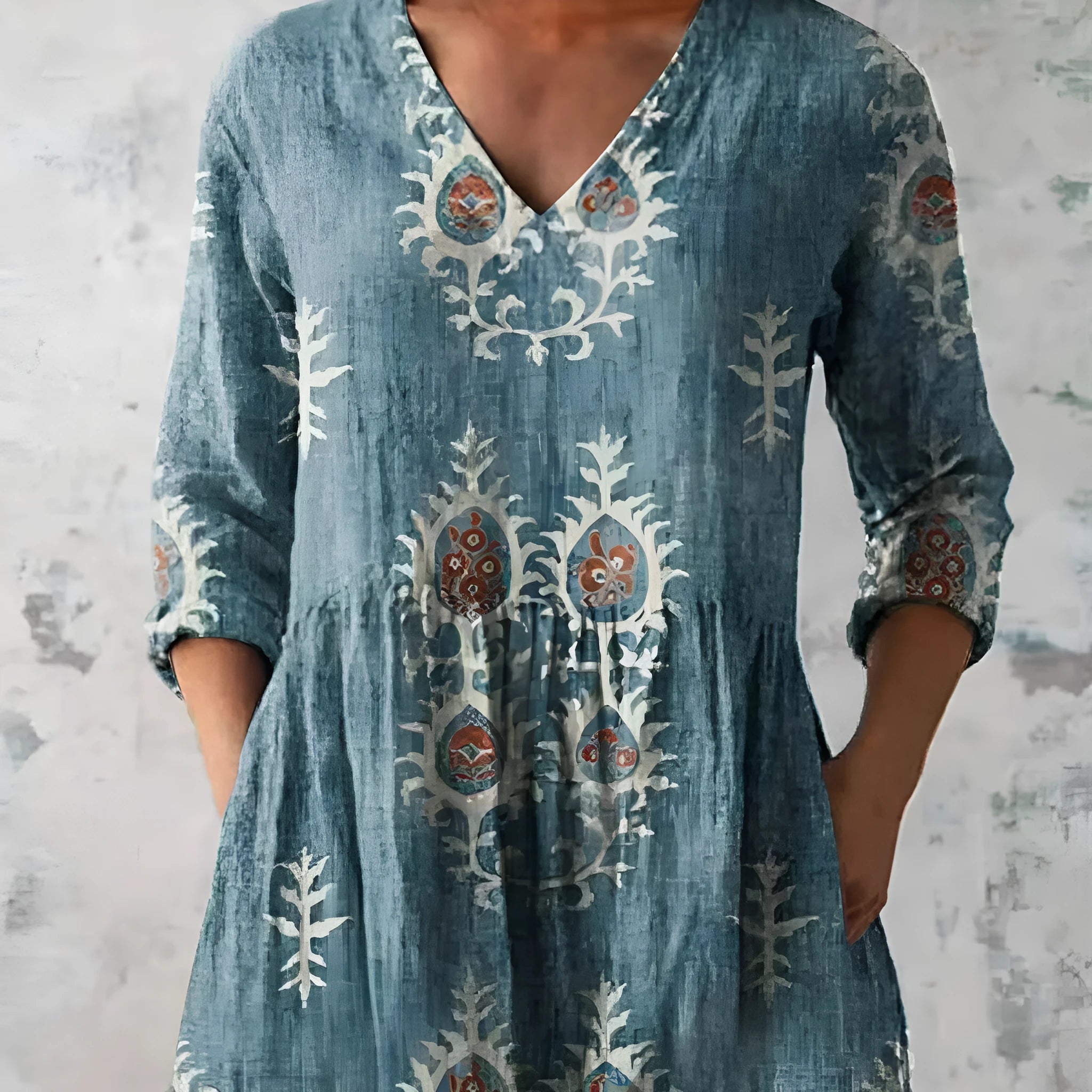 Women's printed loose dress with ruffled 3/4 wave sleeves and an elasticated waist on a hanger.