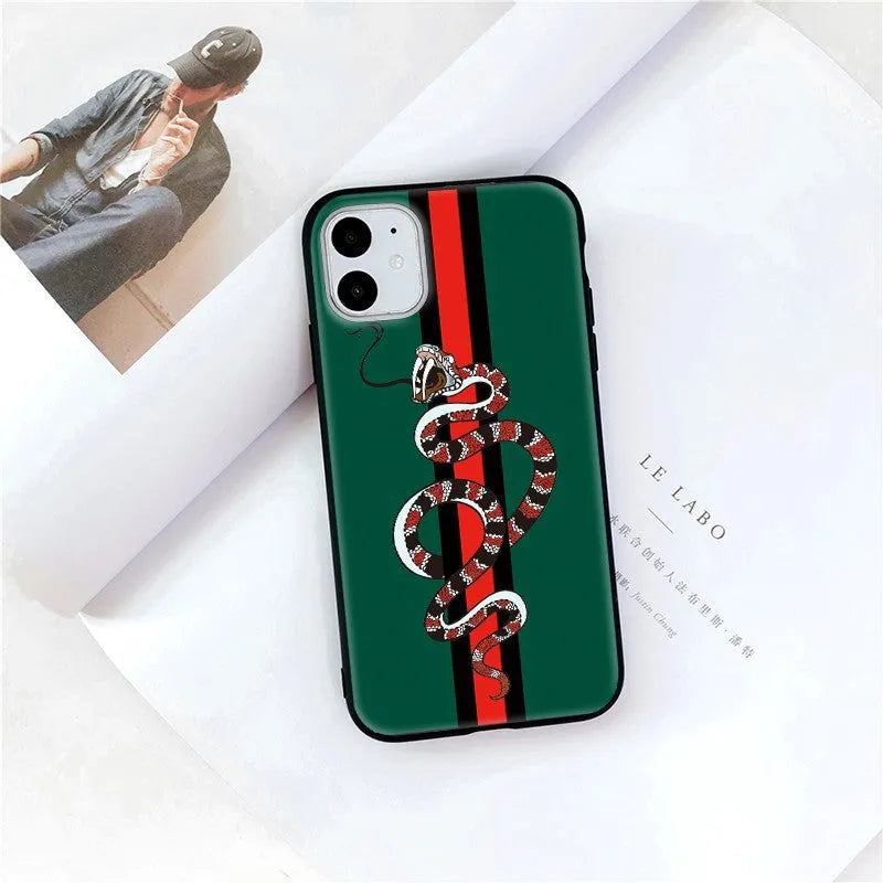 Black frosted soft silicone iPhone case with a cartoon snake UV painting design on the back.
