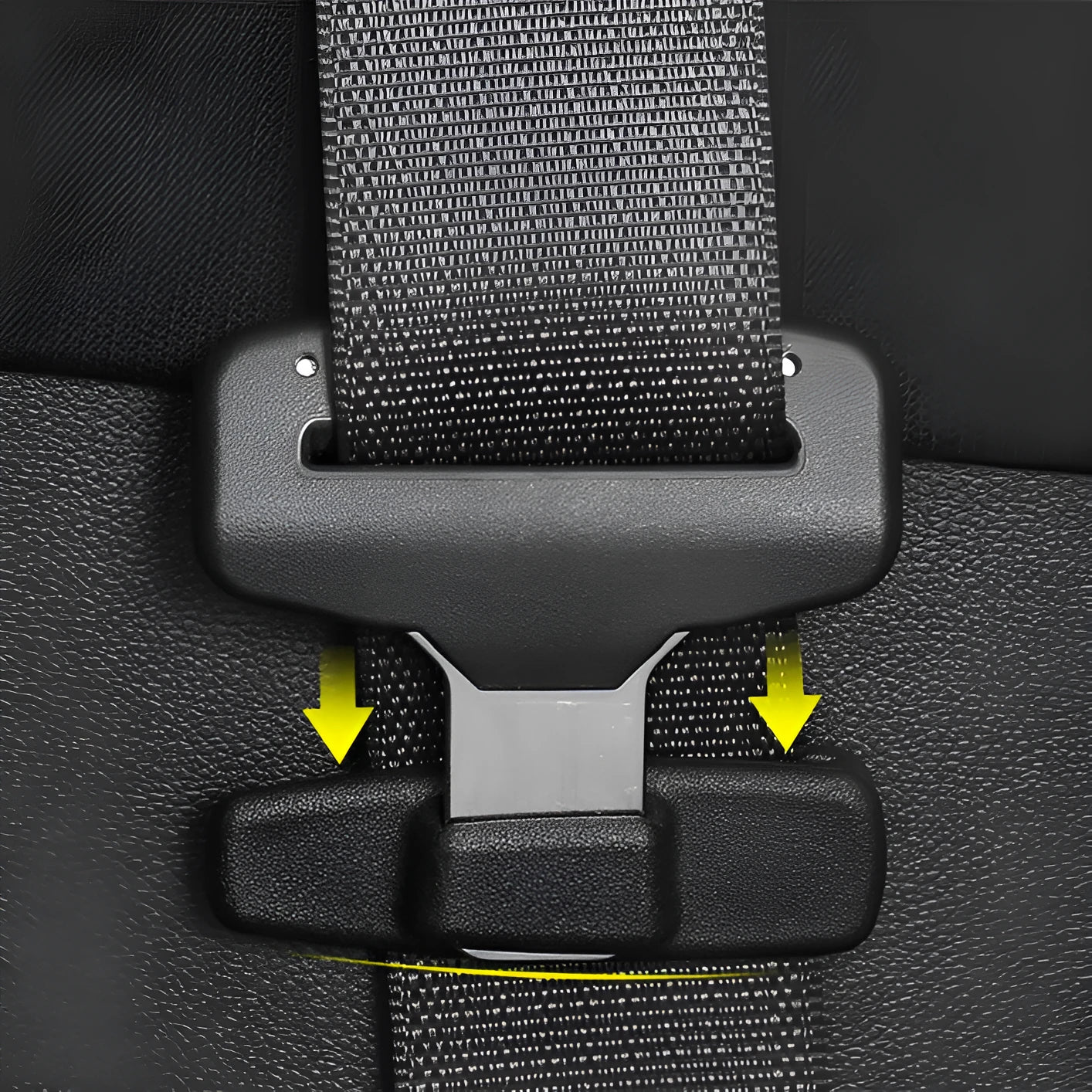 Two black ABS plastic universal car seat belt stopper clips on a white background.