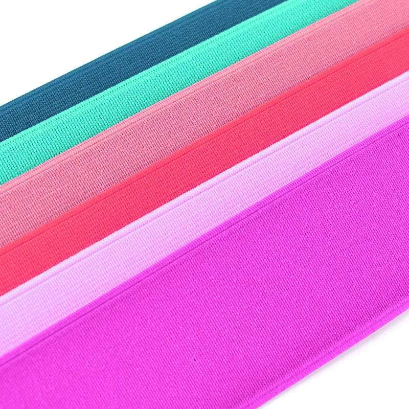 5cm wide rubber elastic band in multiple colours showing 1.5mm thickness for clothing and luggage use