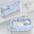 Folding double layer student pencil case in polyester, shown in dark blue, blue, and cream white colour options.