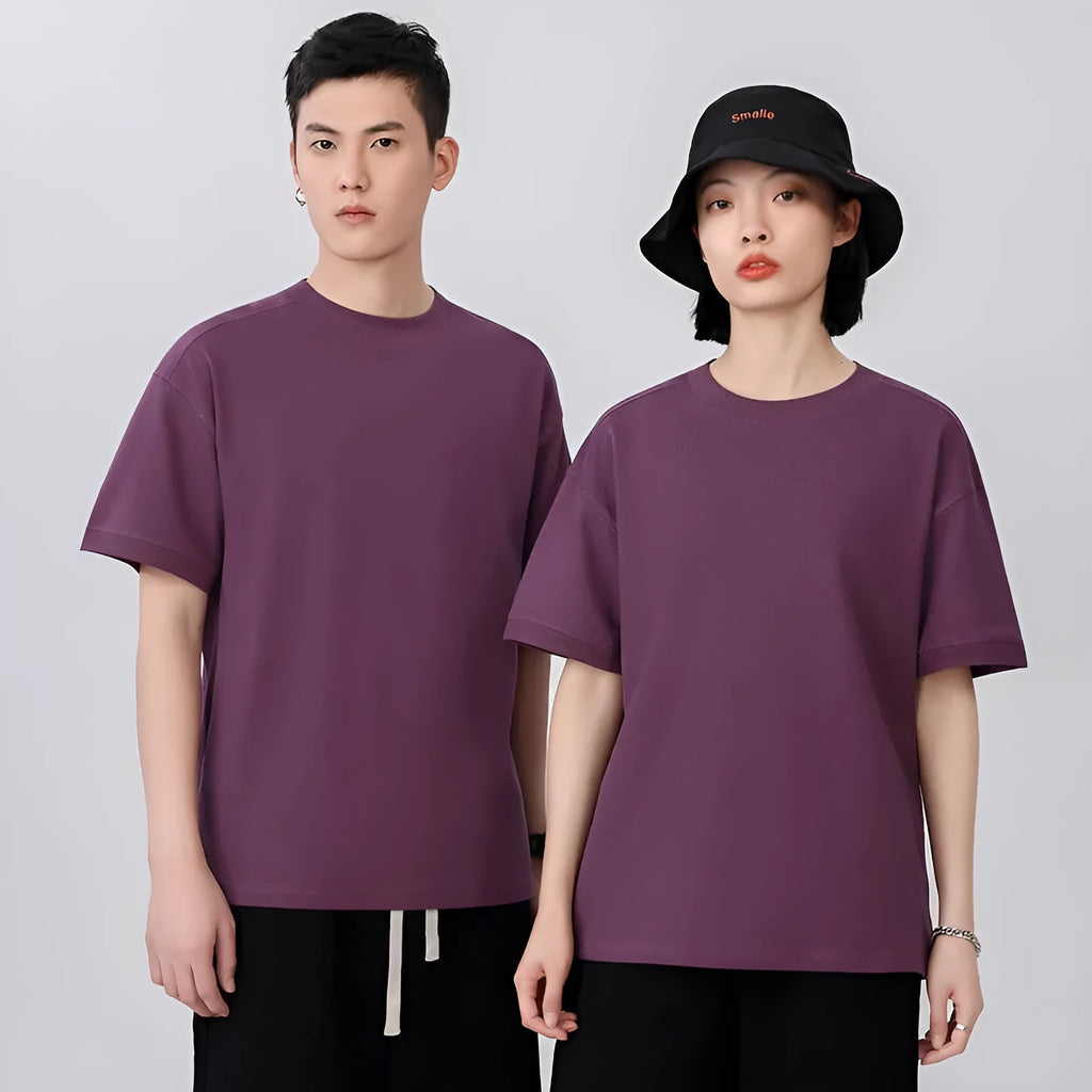 Breathable cotton pique short-sleeved T-shirt in a loose pullover style on a solid colour background.
