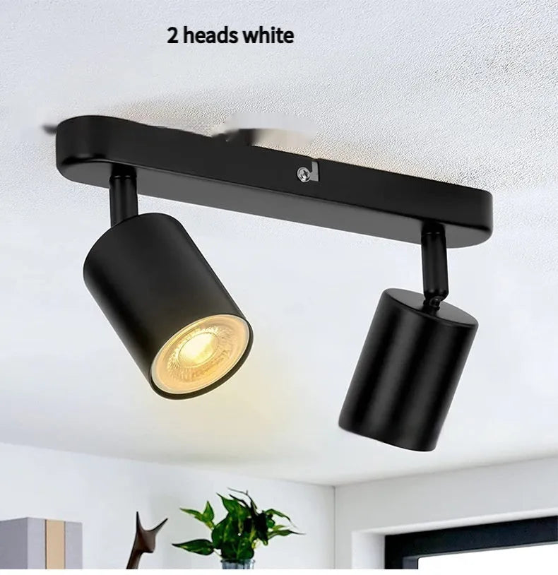 Three-head adjustable ceiling spotlight in white aluminium, angled heads for TV background wall lighting