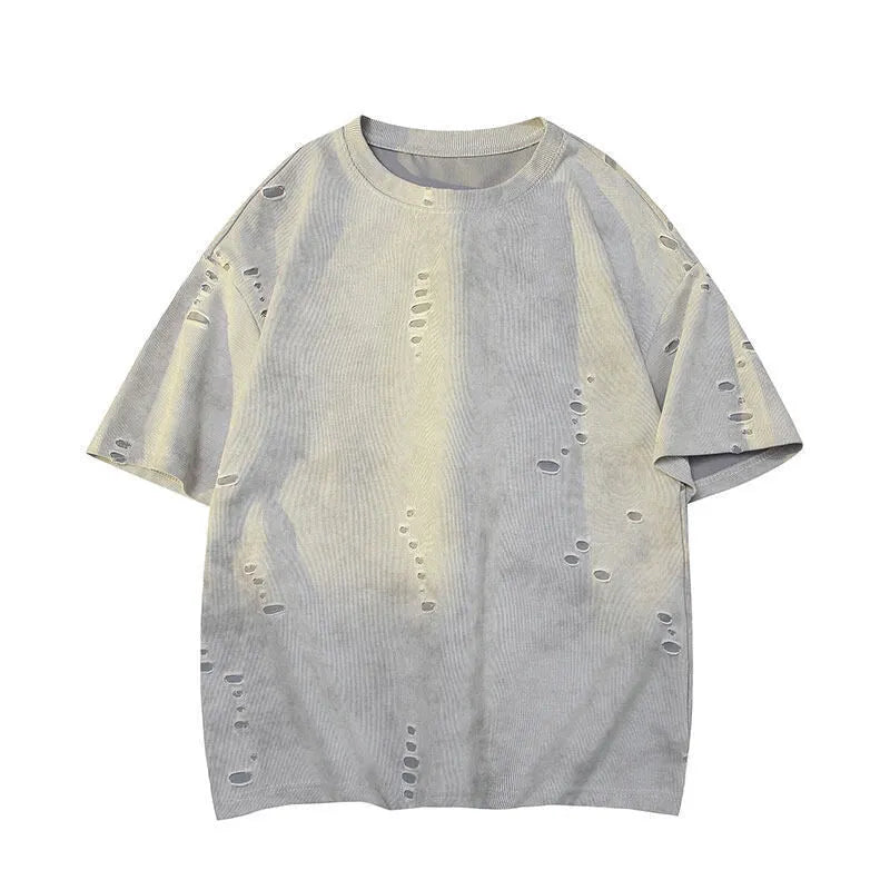 Men's blue loose fit cotton blend T-shirt with ripped detail on short sleeve, laid flat.