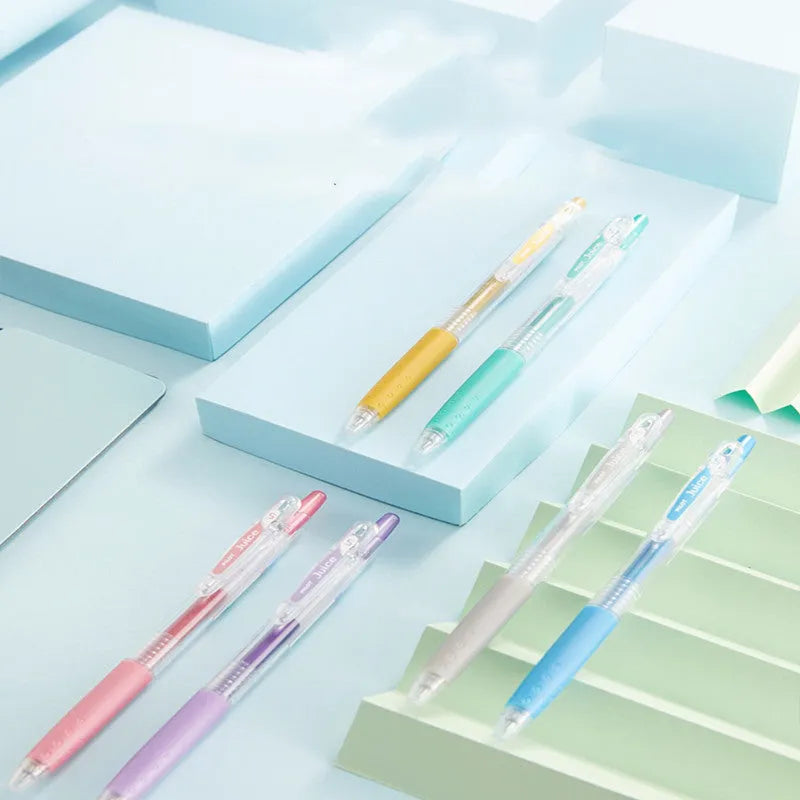 Baiguole brand gel pen with 0.5mm tip shown in metallic gold, classic blue, and soft pastel pink colour options