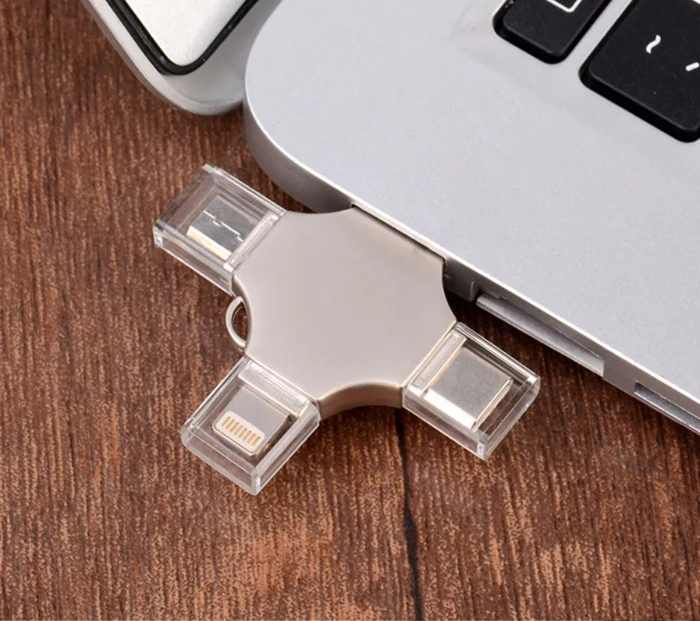 Silver metal 4-in-1 USB 3.0 flash drive with iOS, Micro USB, Type-C, and USB connectors for mobile phone and computer data transfer
