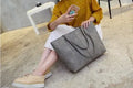 European fashion shoulder bag in black or grey colour for spring and summer casual outfits