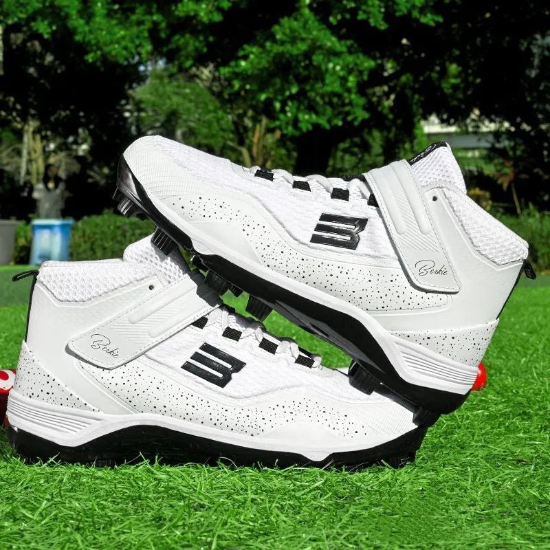 Black and white middle-top training sneakers with Velcro closure and wear-resistant rubber soles for softball