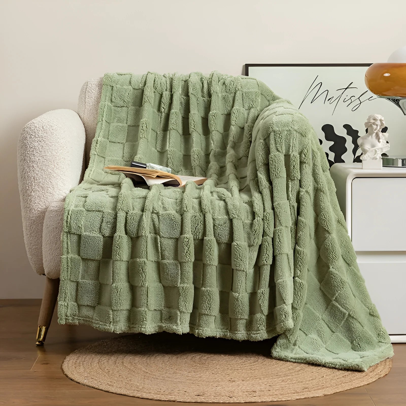 Geometric pattern polyester blanket in cream colour showing textured design and thickened construction
