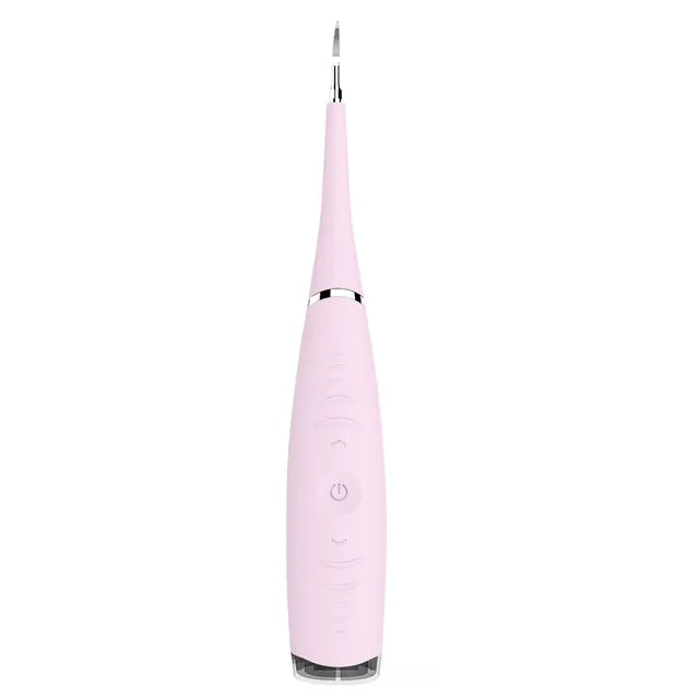 Pink and blue waterproof electric dental scaler tool on a bathroom counter with charging cable.