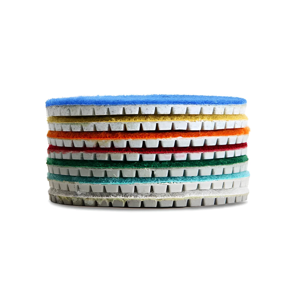 Set of 10 emery stone polishing pads with 80mm diameter and grits from 50 to 3000 mesh.