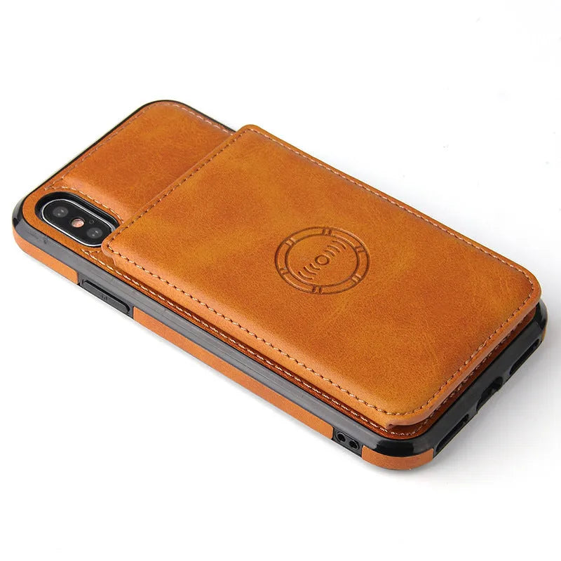 Black imitation leather card wallet phone case for iPhone 11 on a table.